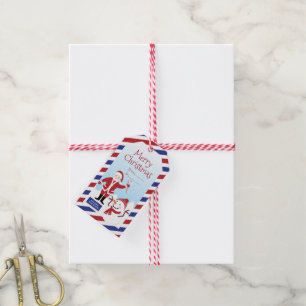Weihnachtsfliege mit Weihnachtsgeschenk Geschenkanhänger