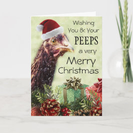 Weihnachtsgebäck in Weihnachtsmannmütze Feiertagskarte