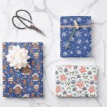 Weihnachtsgeschenk Geschenkpapier Set<br><div class="desc">Schöne Geschenkpackung mit Lebkuchenhäusern,  Schneeflocken und Winterfloralen & Blattwerk</div>