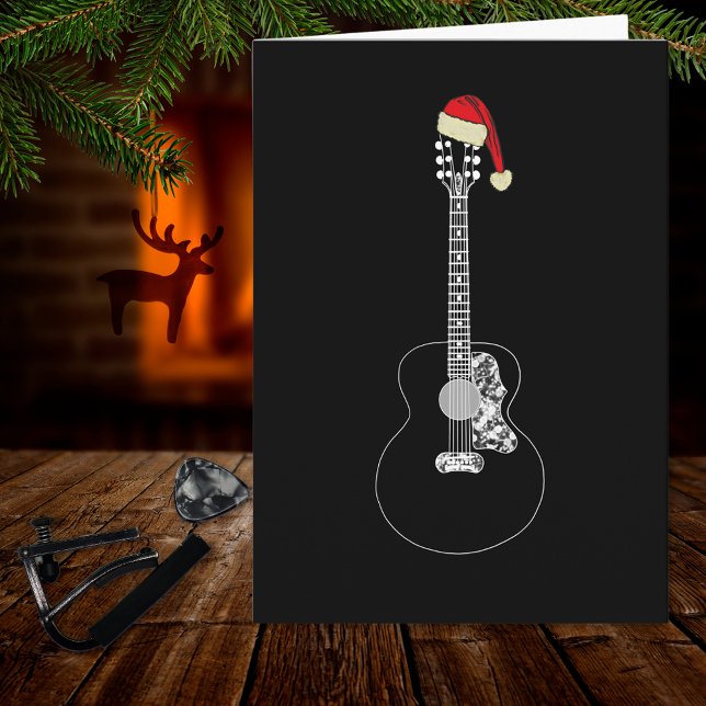 Weihnachtsgitarre cool minimalistisch schwarz-weiß karte (Simple black and white christmas guitar wearing a Santa hat music themed holiday greetings card)