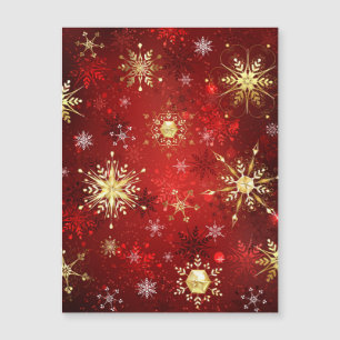 Weihnachtsgoldschneeflocken auf rotem Hintergrund Magneteinladung