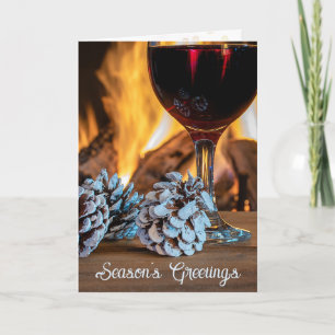 Weihnachtsgrüße Rotwein und Pinienzapfen Feiertagskarte