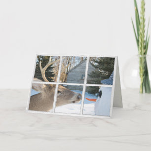 Weihnachtshirsche und Schneemann im Fenster Karte