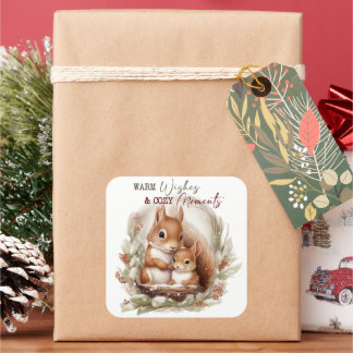 Weihnachtshörnchen warm wünscht gemütliche Momente Quadratischer Aufkleber