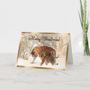 Weihnachtsjungtiger und Tiger-Mama im Schneewald Feiertagskarte