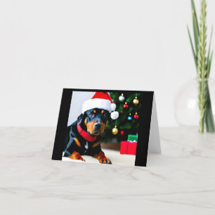 Weihnachtskarte mit Rottweiler in Weihnachtsmannmü Feiertagskarte