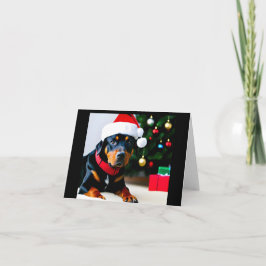 Weihnachtskarte mit Rottweiler in Weihnachtsmannmü Feiertagskarte