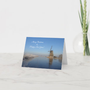 Weihnachtskartenlandschaft mit Windmühle Feiertagskarte