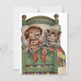 Weihnachtskatze und Hund im Bett Feiertagskarte
