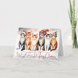 Weihnachtskatzen in Aquarellen in Schneeflocken Feiertagskarte