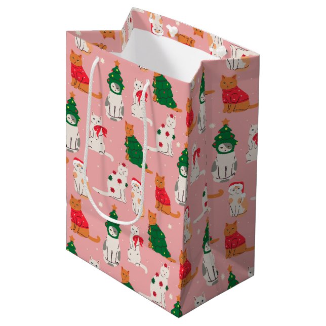 Weihnachtskatzen in festem Muster Mittlere Geschenktüte (Vorderseite Schrägansicht)