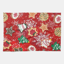 Weihnachtskekse und Schneeflocken auf Rot Geschirrtuch