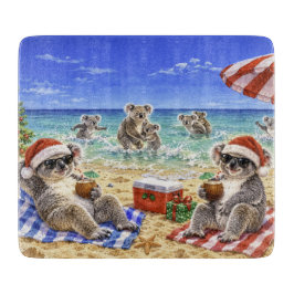 Weihnachtskoalas am Strand Schneidebrett