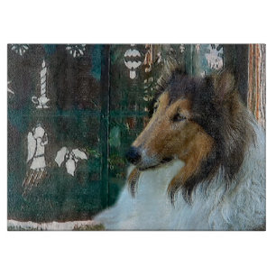 Weihnachtskollie am Fenster Schneidebrett