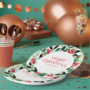 Weihnachtskranz mit grünen Blätter und roten Beere Pappteller