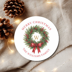 Weihnachtskranz mit roter Schleife und Monogramm Runder Aufkleber