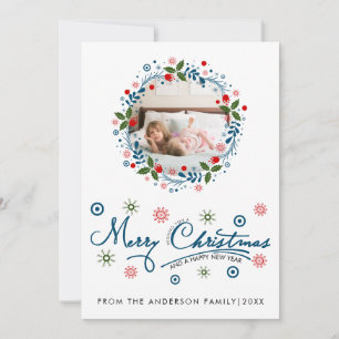 Weihnachtskranz und blaues Schrift-typografisches Feiertagskarte