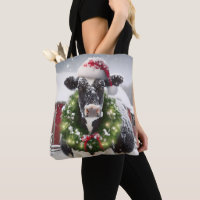 Weihnachtskühe mit einem Kranz