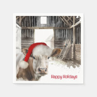 Weihnachtskühe mit Weihnachtsmannmütze