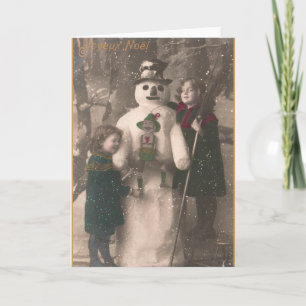 Weihnachtsmädchen und Snowman Vintages Foto Feiertagskarte