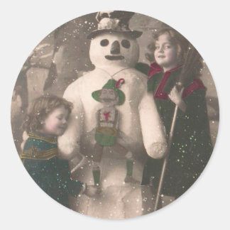 Weihnachtsmädchen und Snowman Vintages Foto Runder Aufkleber