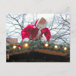 Weihnachtsmann auf dem Dach Feiertagspostkarte