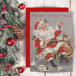 Weihnachtsmann der 1950er Jahre mit Tee und Keksen Feiertagskarte<br><div class="desc">Diese niedliche Weihnachtskarte aus der Mitte des Jahrhunderts besticht durch einen fröhlichen Weihnachtsmann,  der Tee und Kekse mit seinem Sack voller Spielzeuge an seiner Seite genießt. Personalisieren Sie diese,  indem Sie die Nachricht auf der Rückseite anpassen und/oder Ihren Namen hinzufügen.</div>