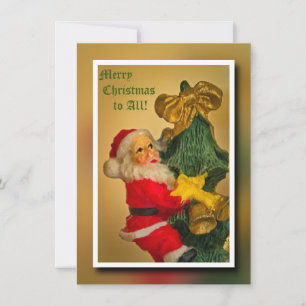 Weihnachtsmann, der auf den Weihnachtsbaum kletter