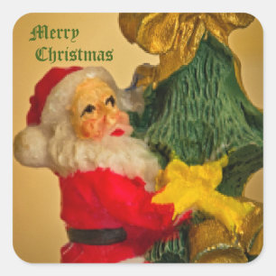 Weihnachtsmann, der auf den Weihnachtsbaum kletter Quadratischer Aufkleber