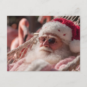 Weihnachtsmann entspannt sich in der Hängematte un Feiertagspostkarte