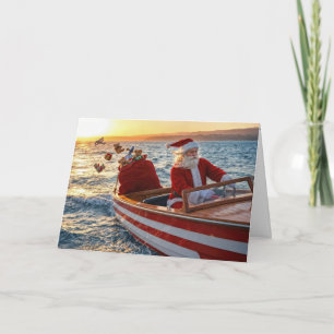 Weihnachtsmann fährt ein Speedboot Karte
