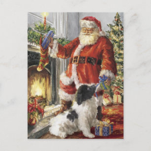 Weihnachtsmann gibt Hund ein Geschenk Feiertagspostkarte