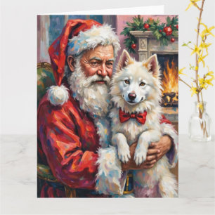 Weihnachtsmann hält Samojede-Christmas-Kunst Karte