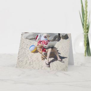 Weihnachtsmann im Urlaub am Strand Feiertagskarte