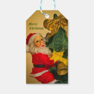 Weihnachtsmann klettert auf den Weihnachtsbaum - V Geschenkanhänger