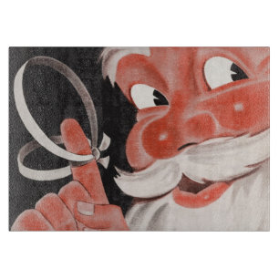 Weihnachtsmann mit Erinnerungsschnur am Finger Schneidebrett