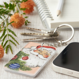 Weihnachtsmann mit Weihnachtsbaumschmuck im Vintag Schlüsselanhänger