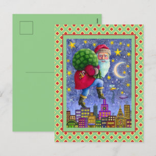 WEIHNACHTSMANN SCHLEICHT ÜBER DÄCHER MIT SPIELZEUG FEIERTAGSPOSTKARTE