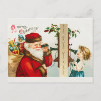 Weihnachtsmann und kleines Mädchen am Telefon
