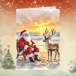 Weihnachtsmann und Rentiere am Strand Personalisie Feiertagskarte
