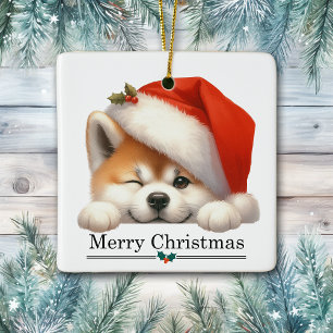 Weihnachtsmannmütze zwinkerndes Akita-Welpe Frohe Keramikornament