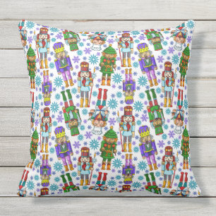 Weihnachtsmuster mit Nussknacker und Schneeflocken Kissen