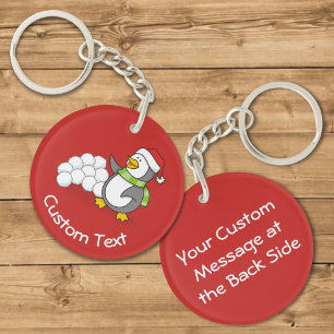 Weihnachtspenguin mit Schneebälle Waving Schlüssel Schlüsselanhänger