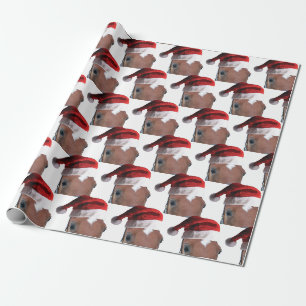 Weihnachtspferd mit einem Weihnachtshut Geschenkpapier