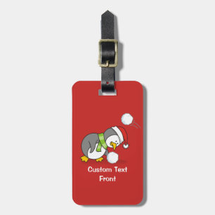 Weihnachtspinguin bekommt eine Schneeball Gepäckanhänger