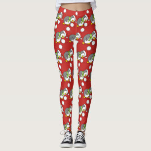 Weihnachtspinguin bekommt eine Schneeball Leggings