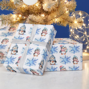 Weihnachtspinguine und Schneeflocken Geschenkpapier