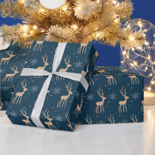 Weihnachtsrentiere und Schneeflocken blau Geschenkpapier