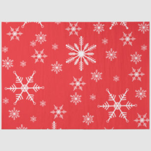 Weihnachtsschneeflocke auf Rot Seidenpapier