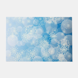 Weihnachtsschneeflocken auf blauem Hintergrund Fußmatte